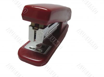 Red stapler isolated on the white background