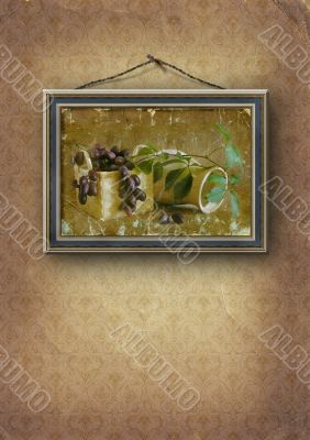 picture in a frame hangs on an old wall