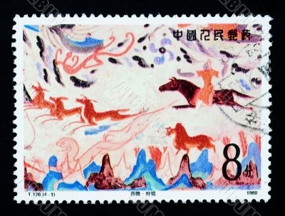 A stamp printed in China shows Chinese ancient wall painting art