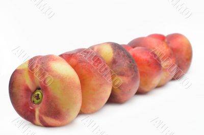 Fig peaches on a white background