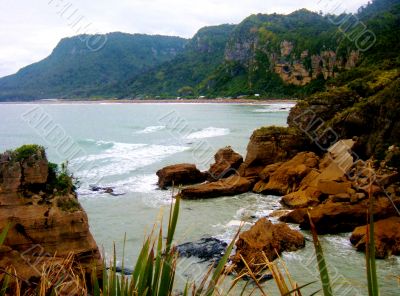 Rocky River Mouth And Mountains