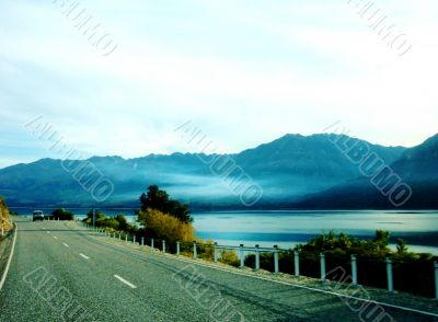 Misty Lake By Road 