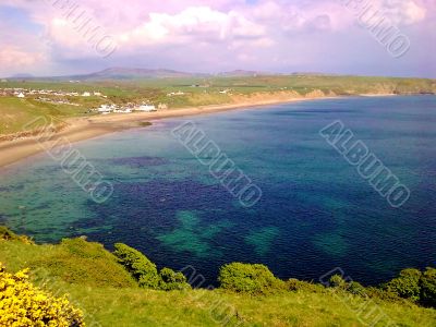 Crystal Clear Sea And Hills