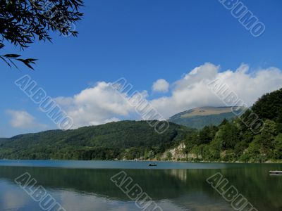 Panorama of a mountain lake in the Alps