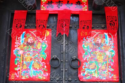 Doorknob and red paper decorations