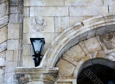 Vintage night light on the gray wall