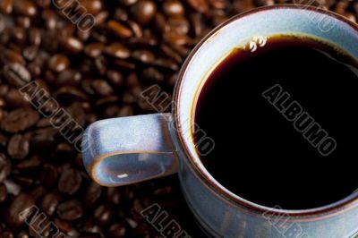 coffee mug and coffee beans