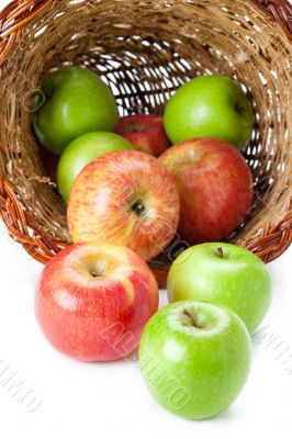 red and green apples in a basket