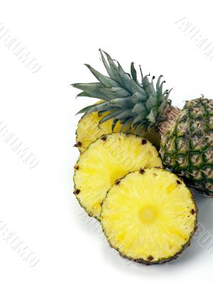 pineapple top and slices on white