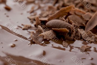 grated chocolate with melted chocolate