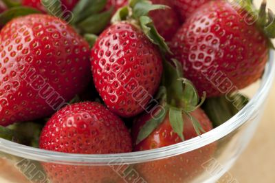 close up shot of strawberries in bowl