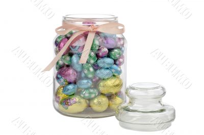 glass bottle of an chocolate easter eggs