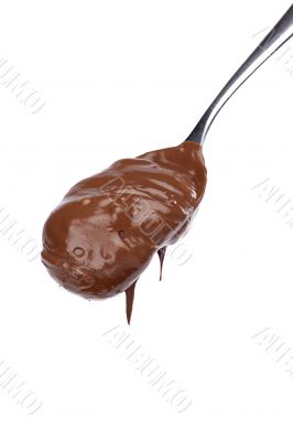 melted chocolate on a spoon