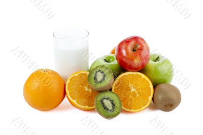 glass of milk and assorted fruits