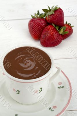 melted chocolate with strawberries