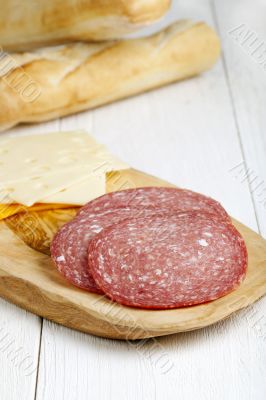 garnishing a ham sandwich