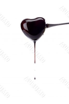 heart shaped coated with chocolate syrup