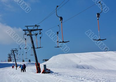 skiers on the lift