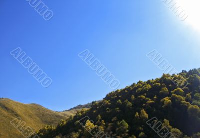 Autumn and caucasus mountains. Season landscape