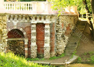 Grotto on the pond&rsquo;s shore