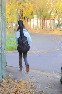 girl with a guitar in a case