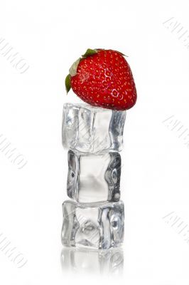stack of ice cubes with strawberry on top