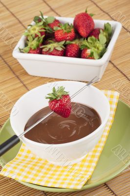 strawberries and chocolate syrup