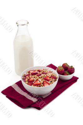 strawberries and milk on the cereals
