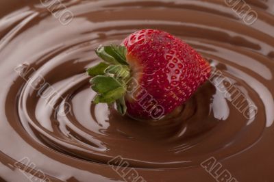  strawberry on a melted chocolate