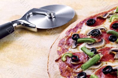 pizza with pizza slicer