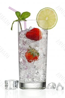glass of ice cubes and strawberries with decoration on top