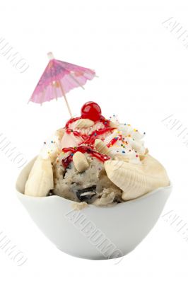 banana split sundae on a white bowl