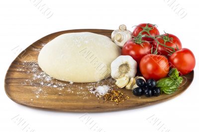 pizza dough with ingredients