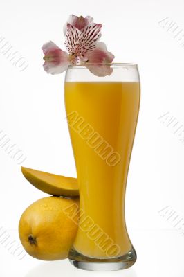 image of mangoes and juice glass