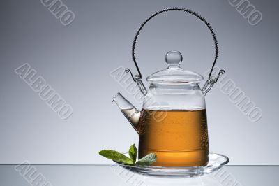 tea in a transparent kettle