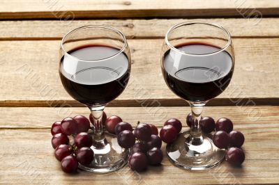 high angle view of wine glass and grapes