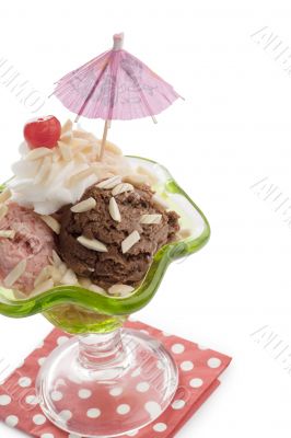 a cup with a scoop of ice cream