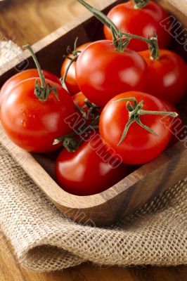 a bowl of red tomatoes