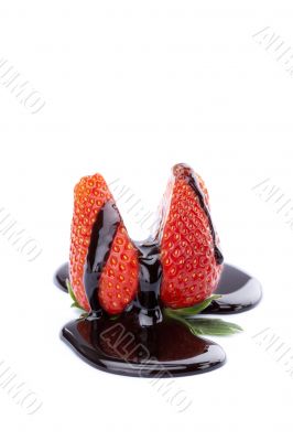 sliced strawberry with melted chocolate