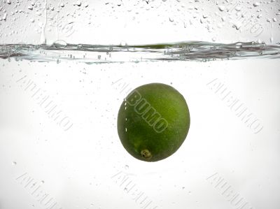 fresh lime dropped into the water