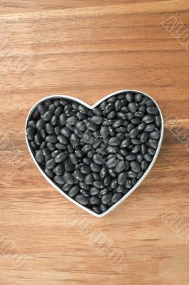 black beans on a heart shape container