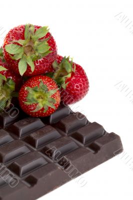 strawberry beside the chocolate bar