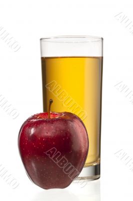 apple beside apple juice glass