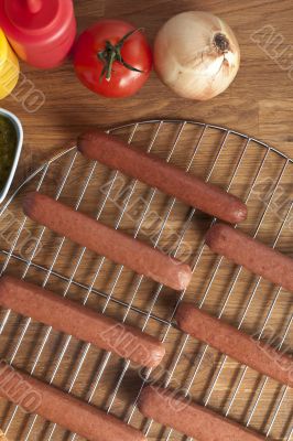 hotdogs on metal grill