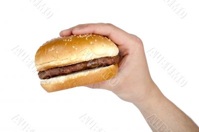 humans hand with hamburger
