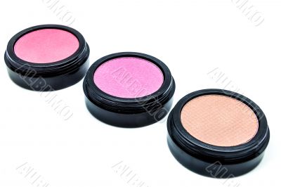 Three cosmetic of diferent colors