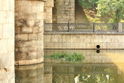 Stone embankment with metal railings 