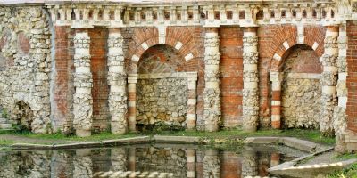 Grotto on the pond&rsquo;s shore