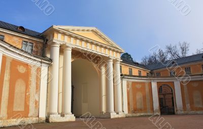 Classical fronton with columns and arch