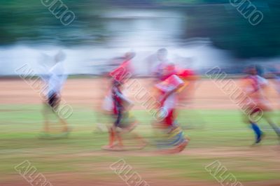 children playing soccer in india